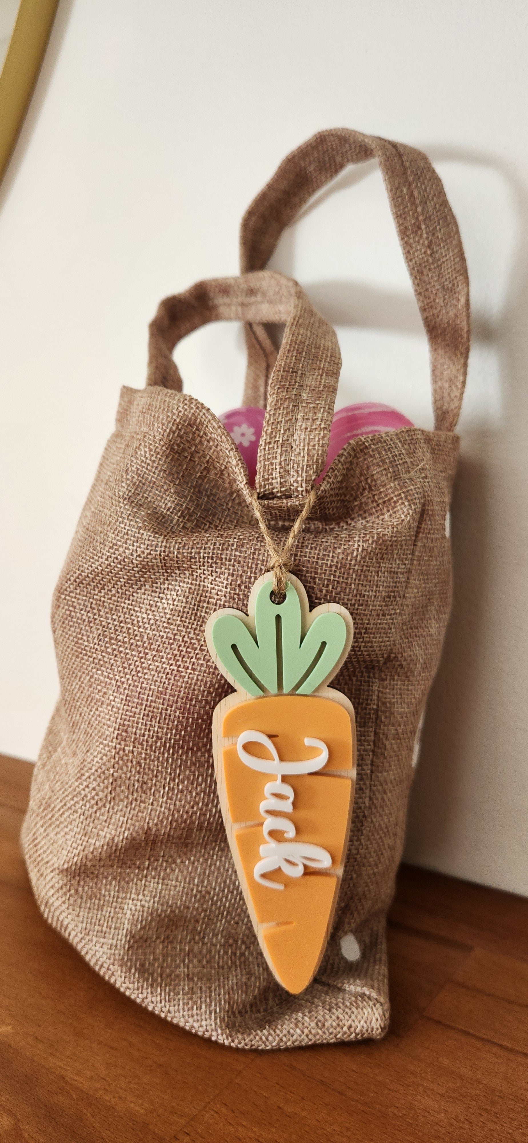Easter-themed name tag with floral design from Kai & I Design, featuring a personalized space for a child's name.